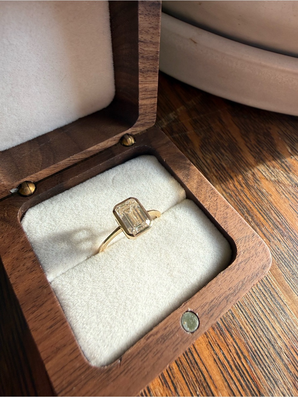 1.98 ct Emerald Cut Lab Grown Diamond Ring in a 14k Bezel Setting